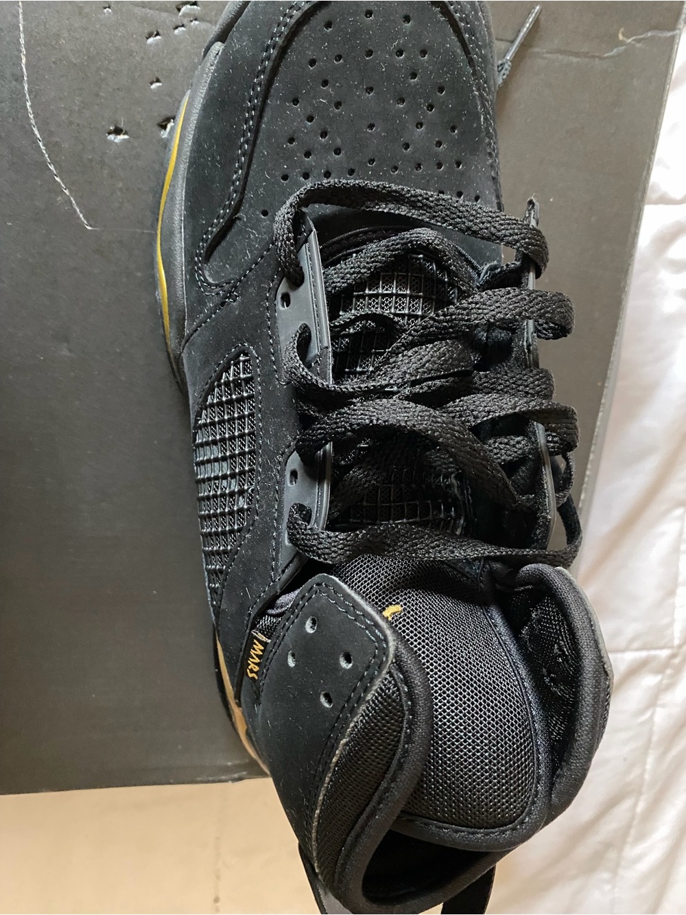 Jordan Men's Black Suede Sneakers with Gold Accent